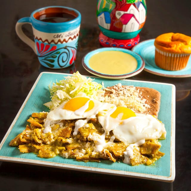 P. Green Chilaquiles with 2 Eggs / Chilaquiles Verdes con 2 Huevos.