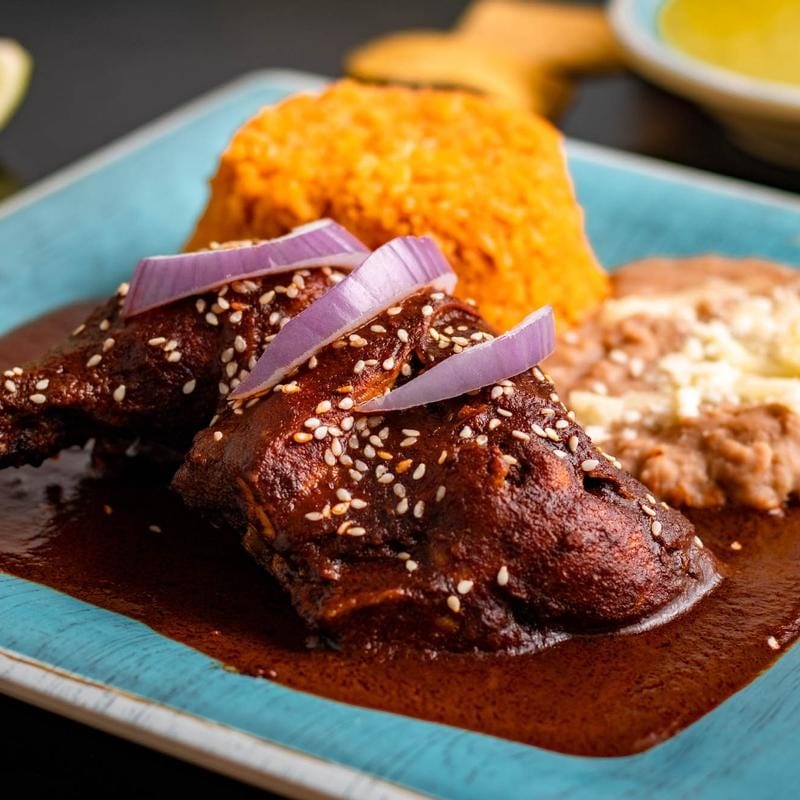 P. Pollo con Mole Poblano.